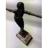 An Art Deco style Bronze Charleston Dancer Figurin