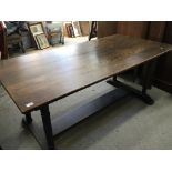 A solid oak refectory table the rectangular top on