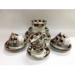 A Royal Vale tea set with giltwork and fruiting de