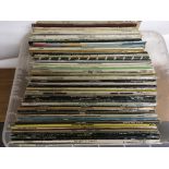 A collection of LPs by various artists including E