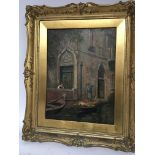 A gilt framed oil painting Venetian scene with a f