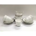 A white Royal Standard tea set.