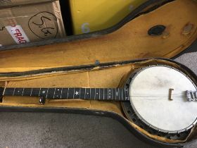 A cased banjo .