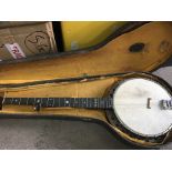 A cased banjo .