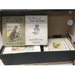 A collection of Beatrix potter books including the