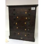 A stained pine collectors cabinet fitted with six