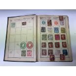 A Lincoln canvas bound Stamp Album, dated August 2