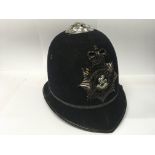 Vintage police helmet with Kent constabulary helme