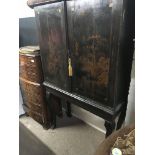 An interesting 18th century and later cabinet with