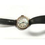 A ladies gold cased watch.