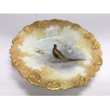 A Royal Worcester plate by Stinton and decorated w