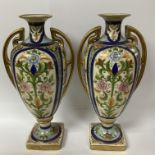A pair of hand decorated Noritake porcelain vases,