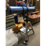 A Sky Watcher telescope , charts and accessories.
