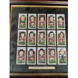 Arsenal Football Memorabilia: Framed items include sets of football cards but overall poor