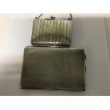 A silver cigarette case 180 grams and a silver pla