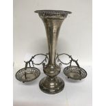 A silver trumpet vase with applied hanging baskets