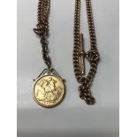 A 9ct gold watch chain with attached 1906 full sov