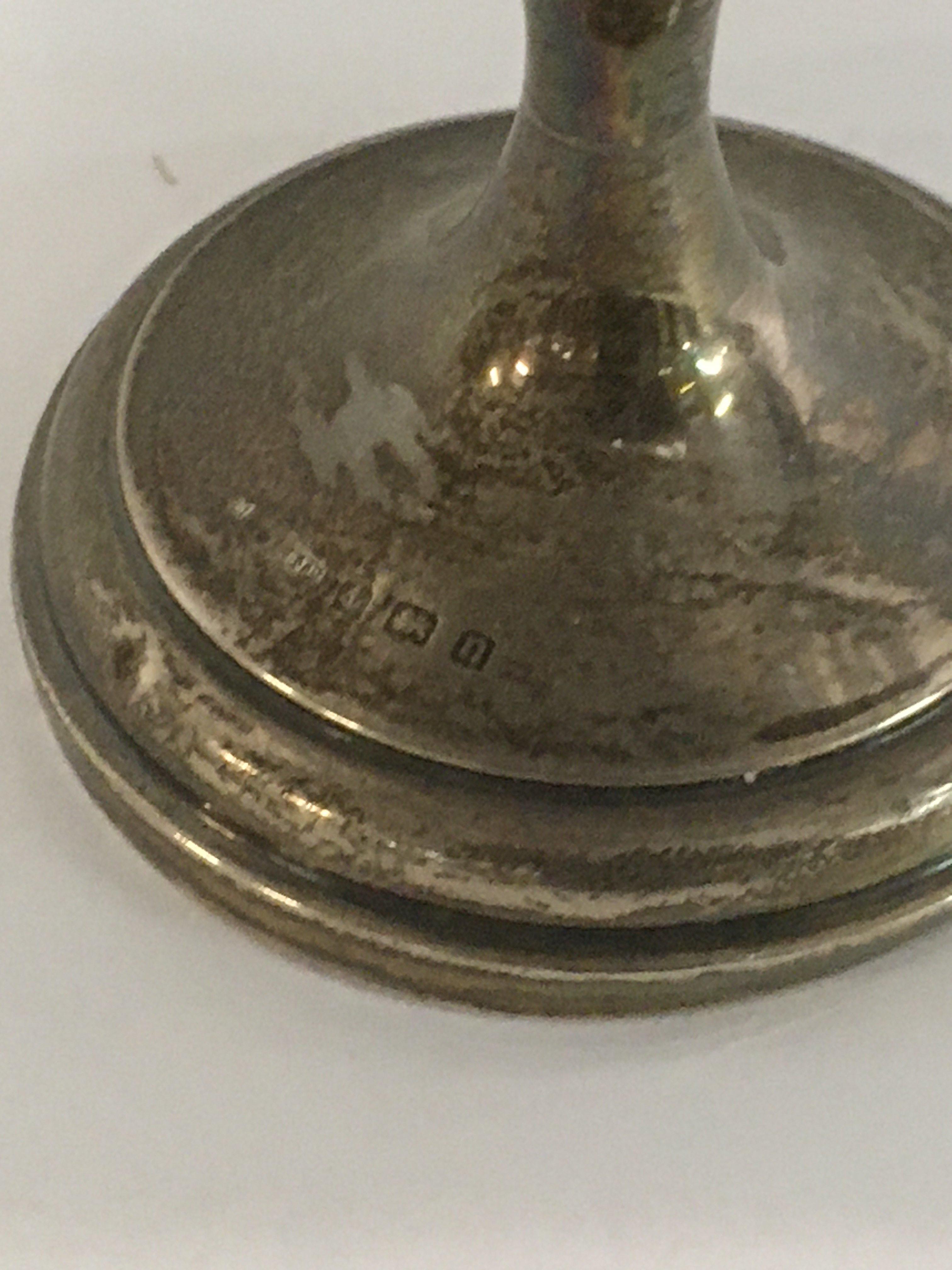 A small silver basket the tapering stem on a circular base Birmingham hallmarks. 128 grams - Image 2 of 2