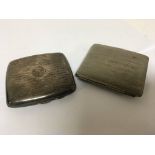 A silver cigarette case weight 84g and one other c