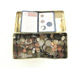 A Tin Containing various Coins.