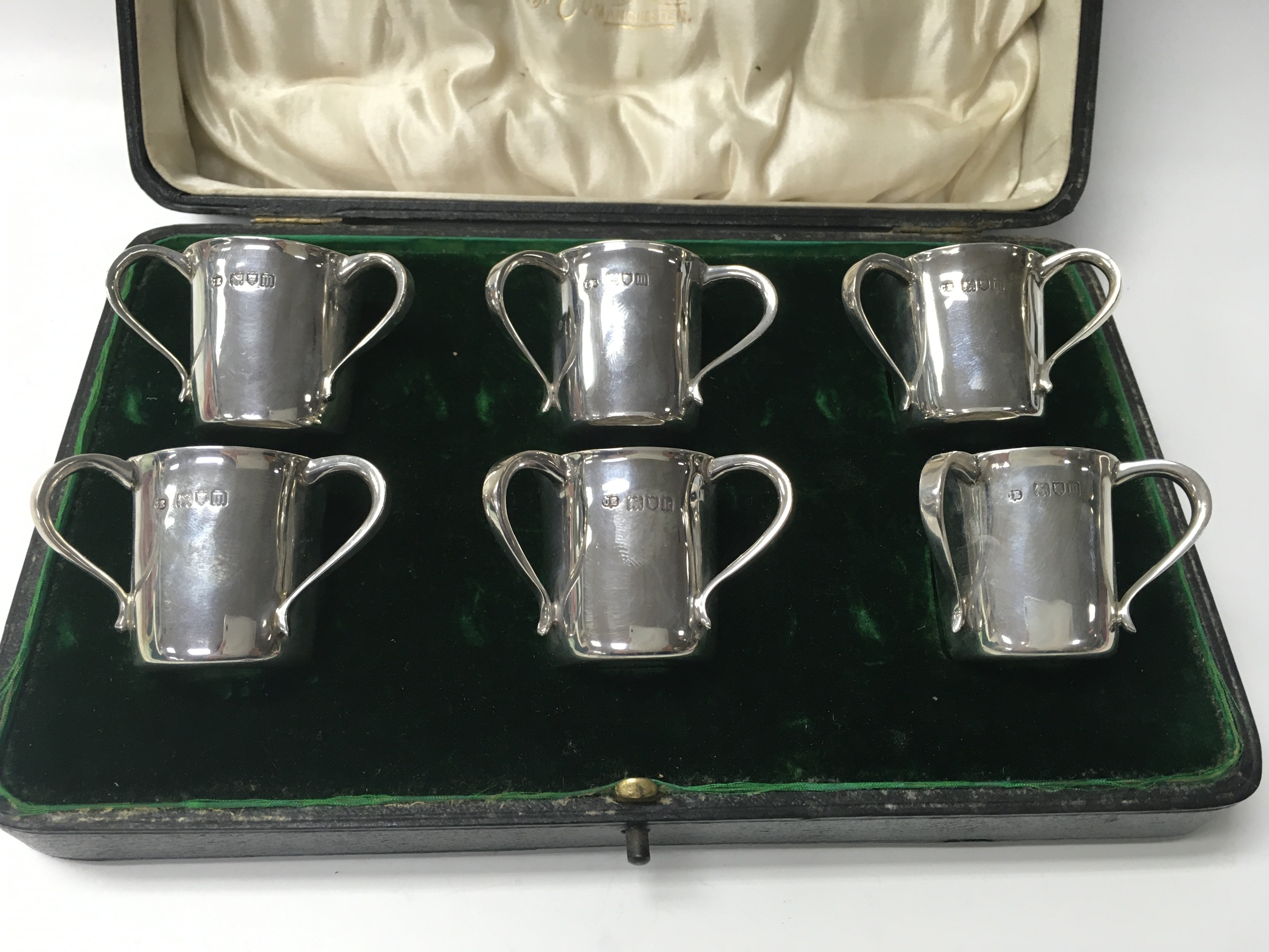 Six cased silver tygs. Hallmarked London - Image 2 of 3