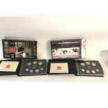 A pair of Royal Canadian mint specimen coin sets. 2002 and 2004 with COAs. NO RESERVE