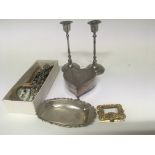 A silver heart shaped box a silver dish with Chest