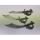 2 Charles Horner sword bookmarks together with a s
