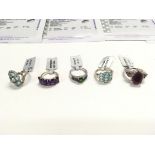 Collection of five sterling silver and gemstone ri