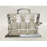 3 x glass bottles in Silver plated tantalus