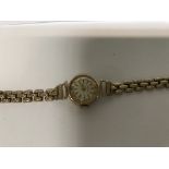 A 9 ct gold ladies watch total weight 12 grams.