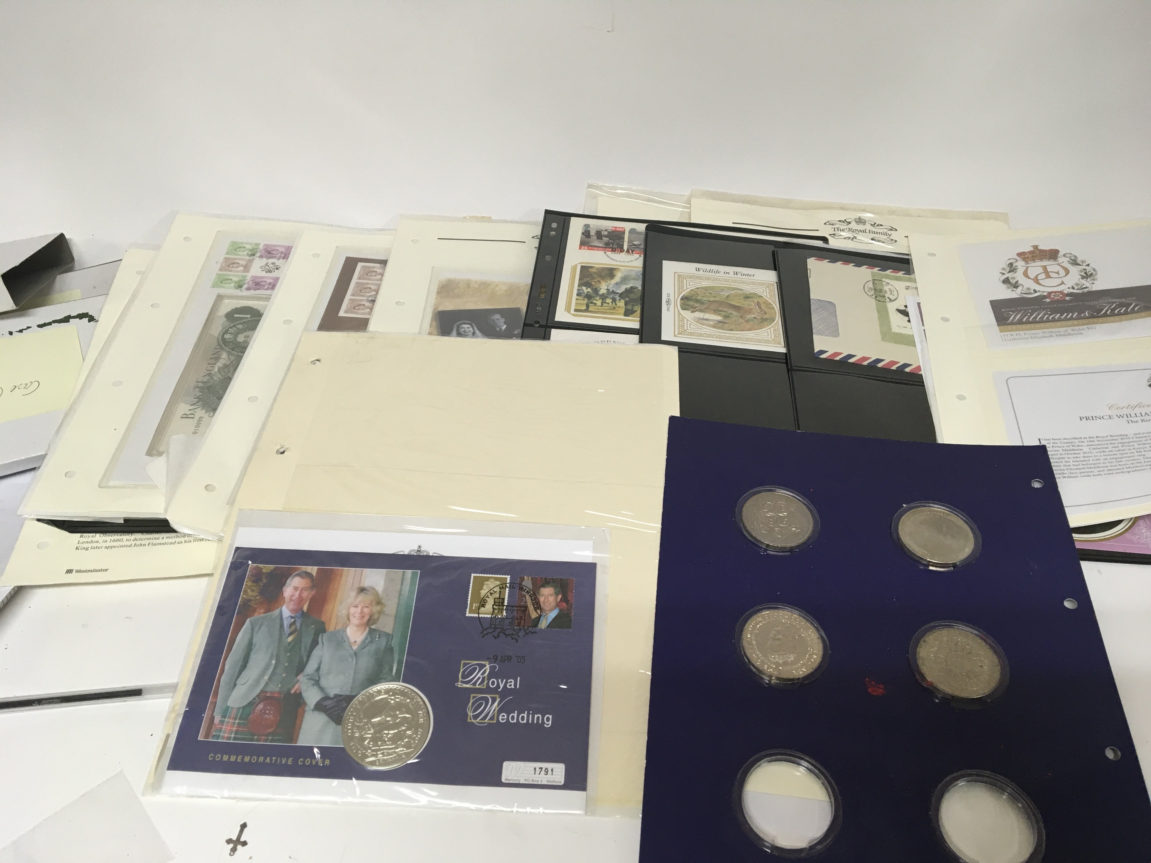 A collection of commemorative coin covers stamp co