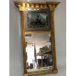 A small Regency mirror with hand painted glass panel. 64cm high x 39cm