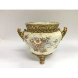 A late Victorian Royal Bonn ewer with giltwork and floral decoration on an ivory ground, approx