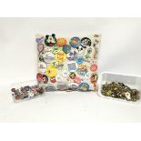 Cushion of badges and a collection of pins, approx