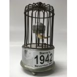 An automaton miniature bird cage clock. 12cm in height approx