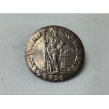 A 1795 1 Guilden coin brooch.