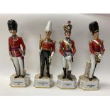 4 continental porcelain British solider figurines.