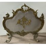 A French gilt bronze and wire mesh baroque style fire screen. 70cm x 71.5cm