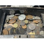 A box of mixed coinage.
