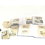Three albums containing a good collection of postcards I world war silk embroidered post cards.