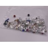 A parcel of mixed unmounted gemstones.