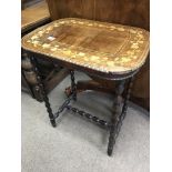 A Quality Victorian walnut occasional table the top with a band of grapevines.