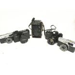 A Collection of Cameras including Yashica. Olympus