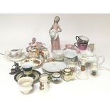 A collection of Goss and other created china and o