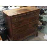 A George III mahogany chest of drawers fitted with