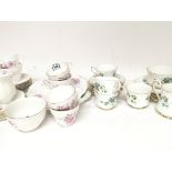 An English porcelain tea set Duchess and a Royal Stafford bone China tea set Croquette pattern (a