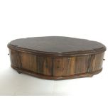 An inlaid walnut trinket box with end and front co