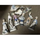A collection of Lladro items including Polar bear, Sports Billy, sailor boy and animals