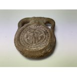 A small early terracotta amphora, perfume bottle. 9cm.